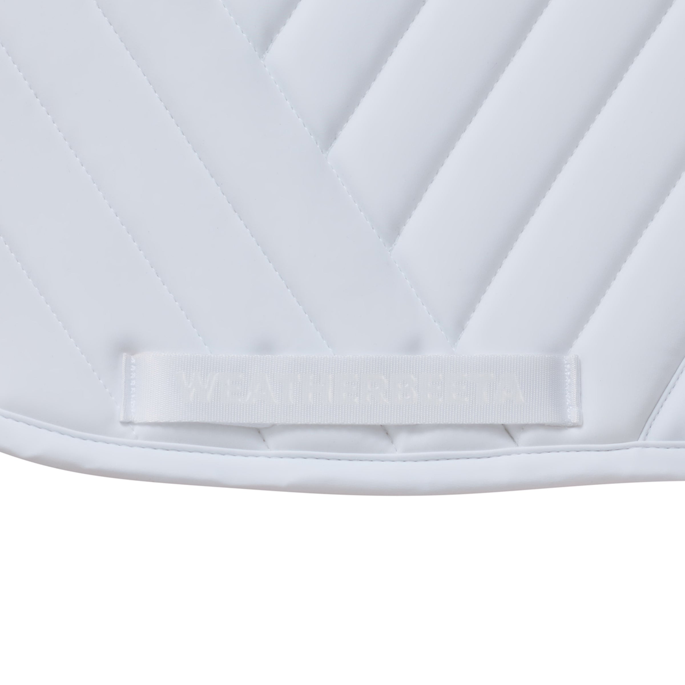White - girth strap keeper detail