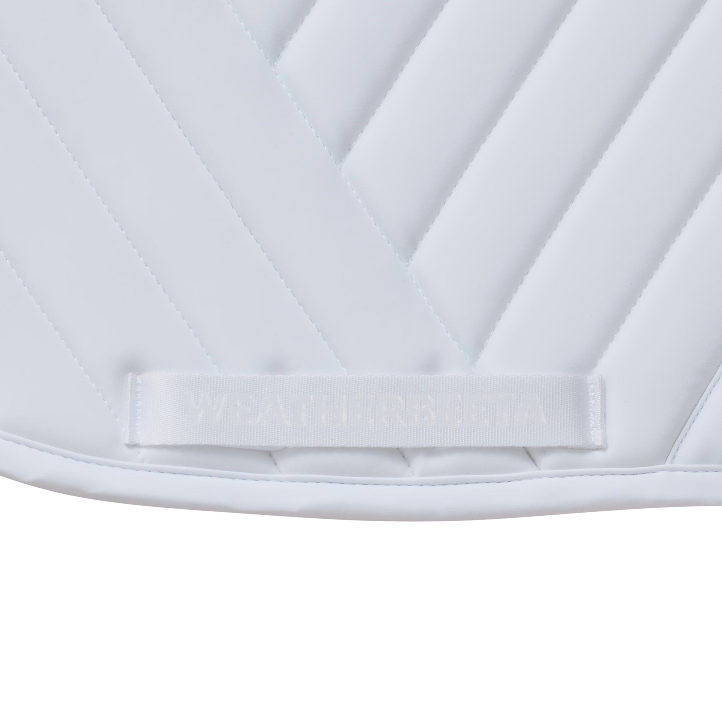 White - girth strap keeper detail