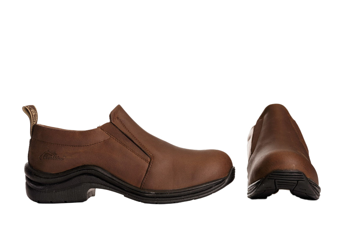 Brown slip-on shoes on a white background
