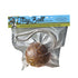 Stay Ball packaging held by a hand with a blurred outdoor background