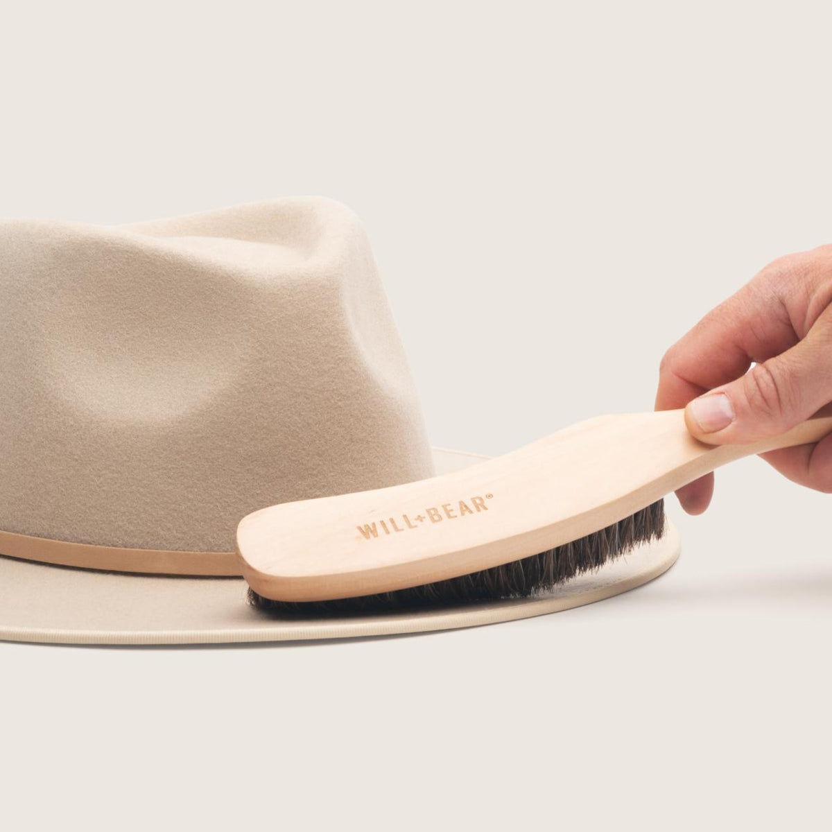 Hat Brush cleaning a wool felt hat
