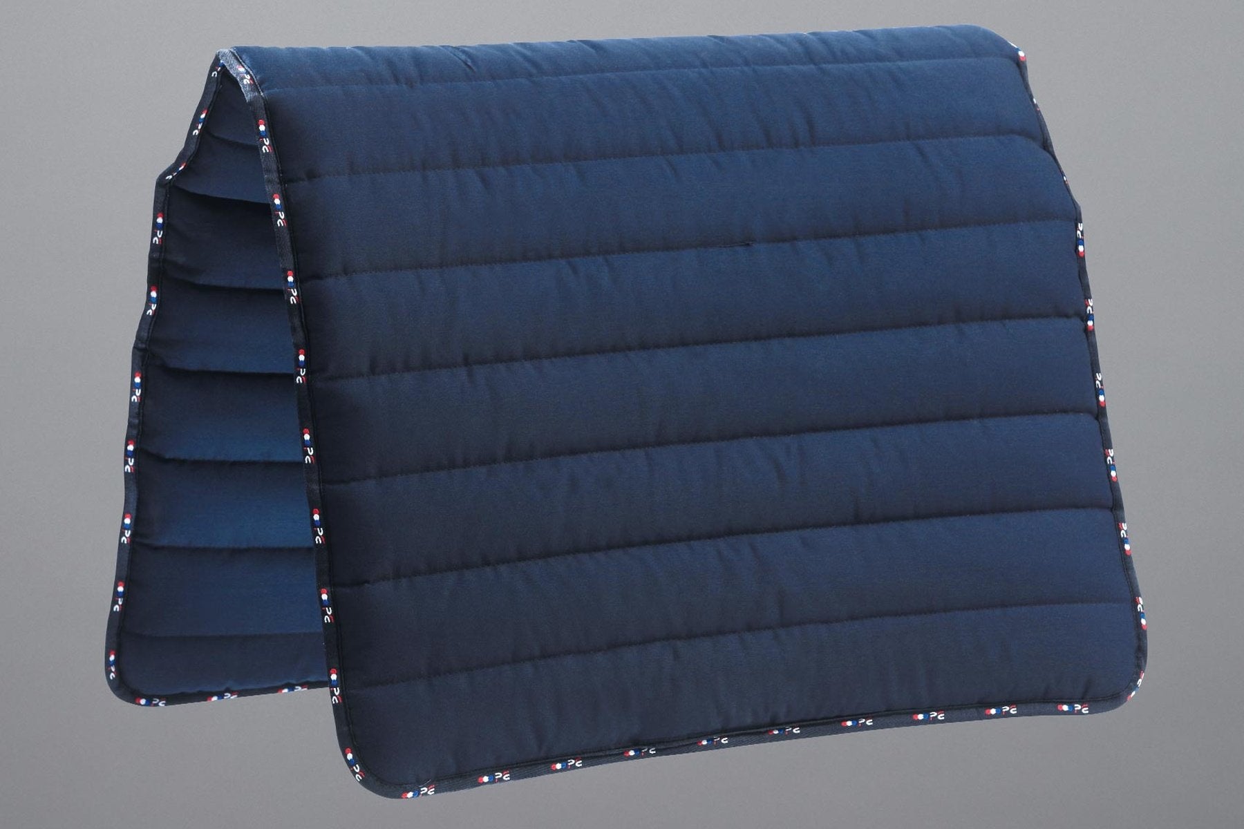 Description:Buster Reversible Saddle Pad_Colour:Navy_Position:1